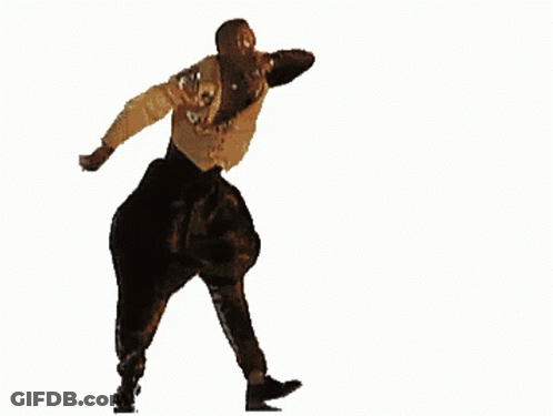 A Man Is Dancing With His Arms Outstretched GIF