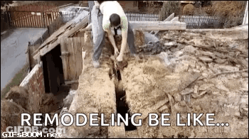 A Man Is Digging A Hole In The Ground With A Shovel In A Dirt Field . GIF