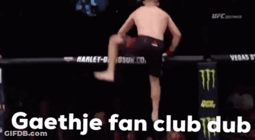 A Man Is Doing A Handstand In A Boxing Ring With The Words Gaethje Fan Club Dub In The Corner GIF