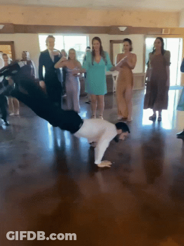 Man Doing Handstand On Dance Floor GIF