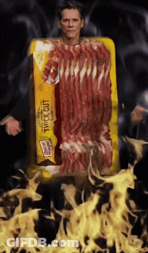 A Man Is Dressed As A Package Of Bacon GIF