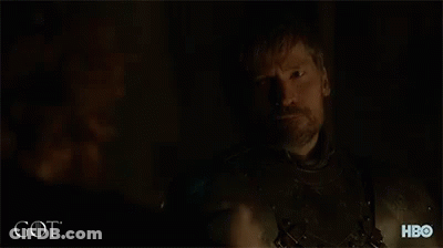 A Man Is Drinking From A Cup With The Word Got On The Bottom GIF