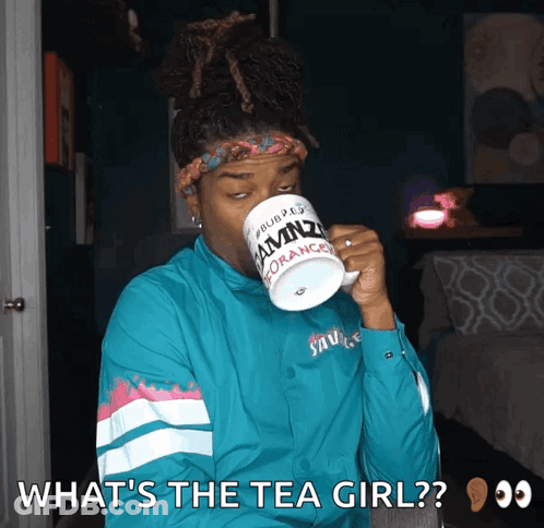 A Man Is Drinking From A Mug That Says Amnz GIF
