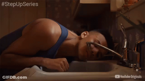 A Man Is Drinking Water From A Faucet With The Hashtag Stepupseries On The Bottom GIF