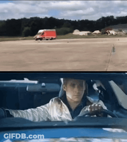 A Man Is Driving A Car And A Red Van Is Driving Behind Him GIF