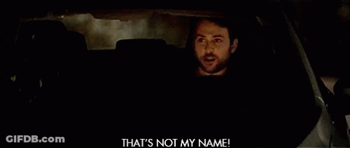A Man Is Driving A Car At Night And Making A Funny Face While Holding A Cell Phone . GIF