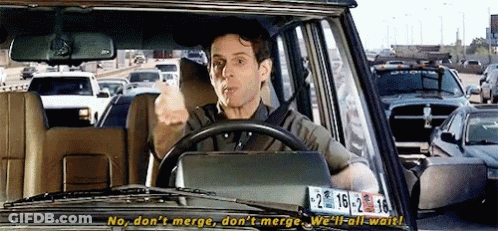 A Man Is Driving A Car With A License Plate That Says 2 16 3 18 GIF