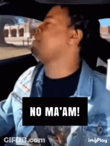 A Man Is Driving A Car With A Sign That Says No Ma 'Am ! GIF