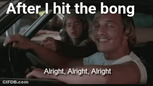 A Man Is Driving A Car With Another Man Sitting In The Back . GIF