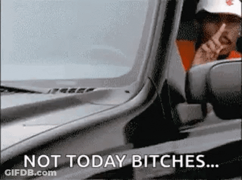 A Man Is Driving A Car With The Words Not Today Bitches Written On The Side GIF