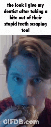 A Man Is Eating A Hamburger And Talking To A Dentist After Taking A Bite Out Of His Stupid Teeth Scraping Tool GIF