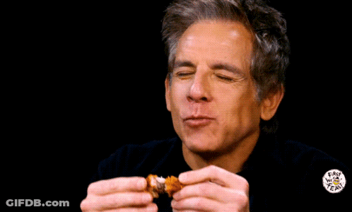 A Man Is Eating A Piece Of Food With The Words Pain Pain Written On The Background GIF