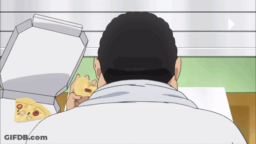 A Man Is Eating A Pizza With A Box Of Pizza In The Background GIF