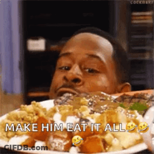 A Man Is Eating A Plate Of Food With The Caption `` Make Him Eat It All '' . GIF