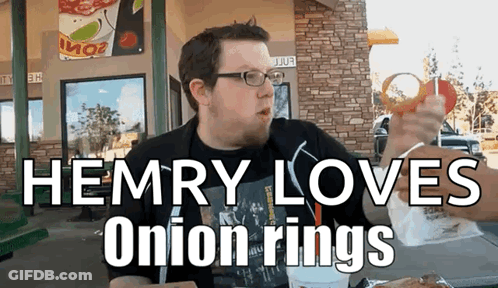 A Man Is Eating An Onion Ring With The Words Hemry Loves Onion Rings GIF