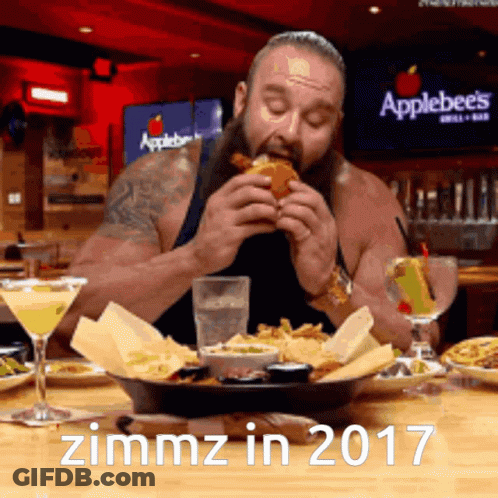 A Man Is Eating At An Applebee 'S In 2017 GIF