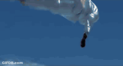 A Man Is Falling Upside Down In The Air GIF