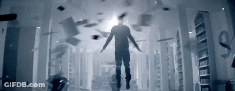 A Man Is Flying Through A Hallway With Papers Falling From The Ceiling GIF