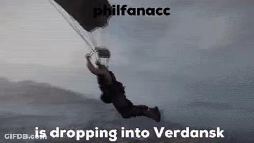 A Man Is Flying Through The Air With A Parachute And The Words `` Philfanacc Is Dropping Into Verdansk '' . GIF