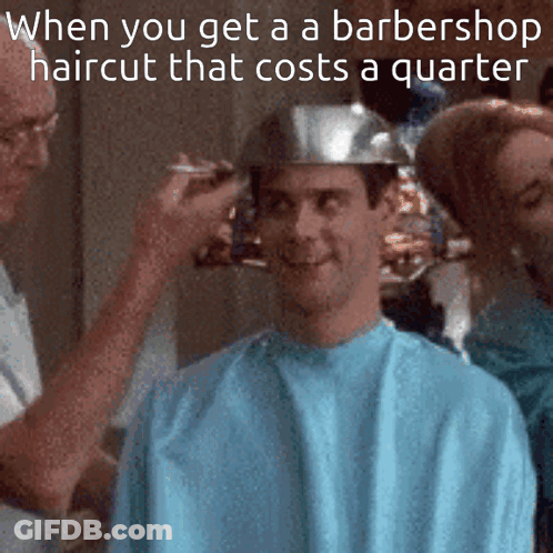 A Man Is Getting His Hair Cut At A Barbershop GIF