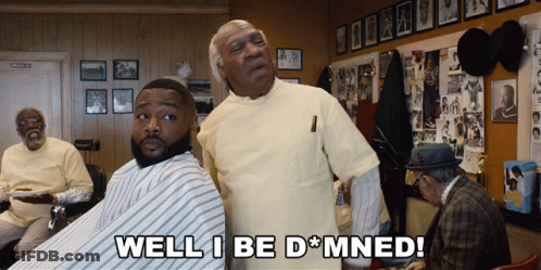 A Man Is Getting His Hair Cut By A Barber And Says Well I Be Damned GIF