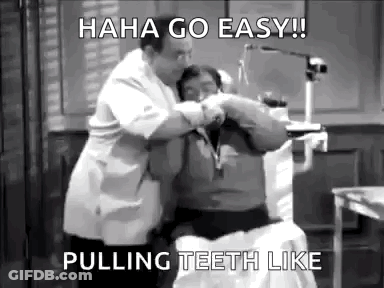 A Man Is Getting His Teeth Pulled By A Dentist . GIF