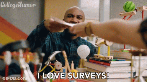 A Man Is Giving A Piece Of Paper To Another Man Who Is Sitting At A Desk With A Stack Of Books . GIF