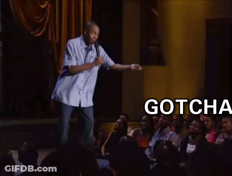 A Man Is Giving A Speech In Front Of A Crowd And The Words Gotcha Bitch Are Visible GIF