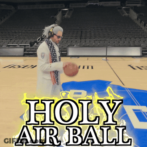A Man Is Holding A Basketball On A Basketball Court With The Words Holy Air Ball Above Him GIF
