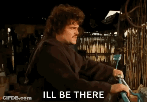 A Man Is Holding A Bicycle And Saying Ill Be There GIF
