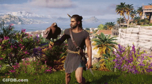 A Man Is Holding A Bird In His Hand In A Field GIF