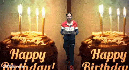 A Man Is Holding A Birthday Cake In Front Of A Happy Birthday Sign GIF