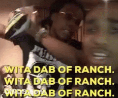 A Man Is Holding A Bottle Of Beer And Says ' Rita Dab Of Ranch ' On It . GIF