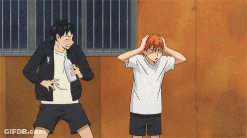 A Man Is Holding A Bottle Of Water And Another Man Is Holding A Ball . GIF