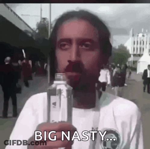 A Man Is Holding A Bottle Of Water And Says Big Nasty . GIF