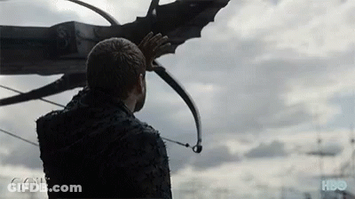 A Man Is Holding A Bow And Arrow In Front Of A Cloudy Sky With Hbo Written On The Bottom Right GIF