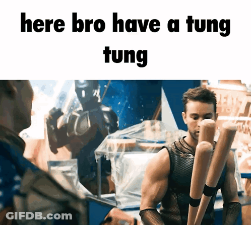 A Man Is Holding A Bunch Of Baseball Bats And Says " Here Bro Have A Tung Tung " GIF