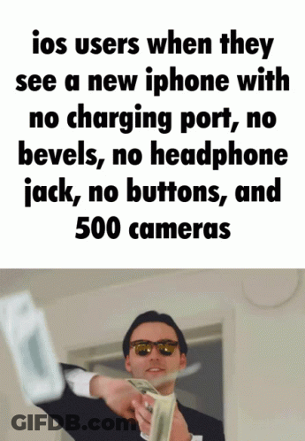 A Man Is Holding A Bunch Of Money In Front Of A Sign That Says Ios Users When They See A New Iphone With GIF