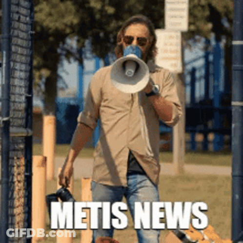 A Man Is Holding A Camera And A Megaphone With The Word Metis News On The Bottom GIF