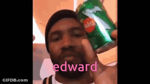 A Man Is Holding A Can Of Sprite In His Hand GIF