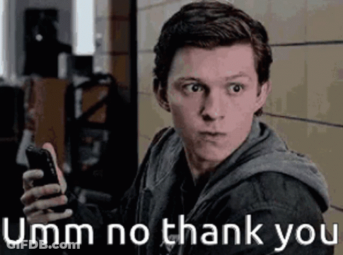A Man Is Holding A Cell Phone In His Hand And Making A Face . GIF
