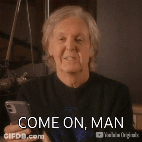 A Man Is Holding A Cell Phone With The Words Come On Man On The Bottom GIF