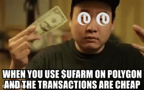 A Man Is Holding A Dollar Bill In Front Of His Eyes GIF