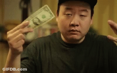 Man Making Funny Face Holding Dollar Bill GIF