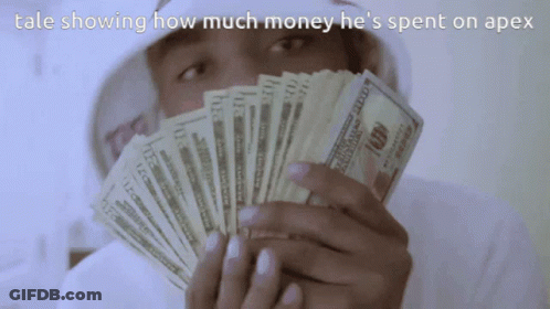 A Man Is Holding A Fan Of 100 Dollar Bills In Front Of His Face GIF