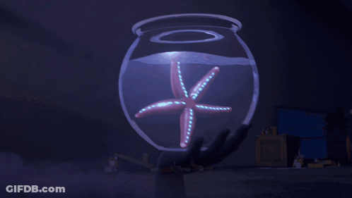 A Man Is Holding A Fish Bowl With A Starfish In It And The Words " My Quest Was Darkly Bountiful " GIF