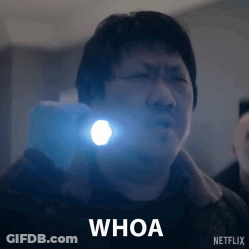 Man Holding Flashlight Saying Whoa GIF