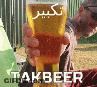 A Man Is Holding A Glass Of Beer With The Word Takbeer On The Bottom GIF