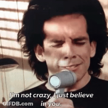 A Man Is Holding A Hair Dryer And Saying I 'M Not Crazy I Just Believe In You GIF