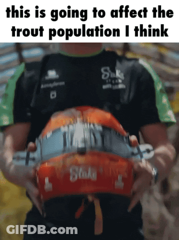 A Man Is Holding A Helmet With The Words This Is Going To Affect The Trout Population I Think On It GIF